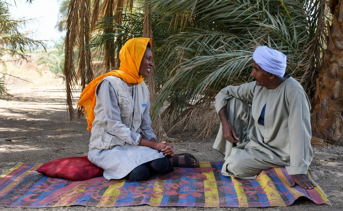 Nyamayaro speaks to a farmer from Aswan, Egypt, who is benefitting from new methods of agriculture and irrigation