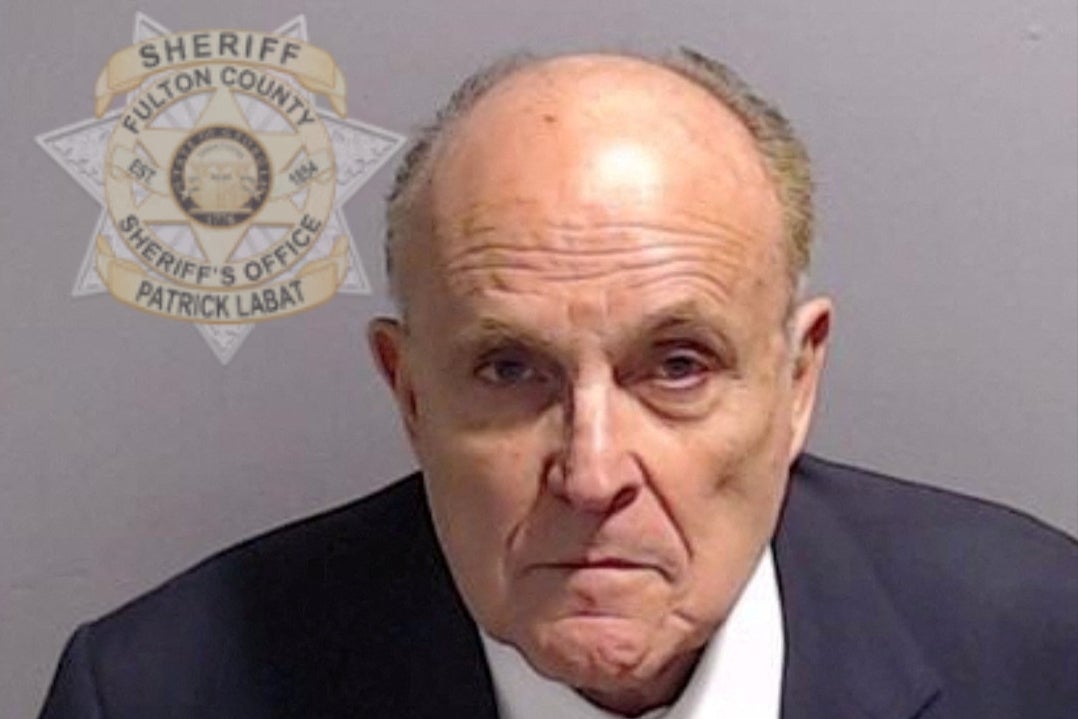 Guiliani’s Arizona charges comes amid charges still pending in Georgia and a bankruptcy case. He is pictured in his Georgia mugshot.