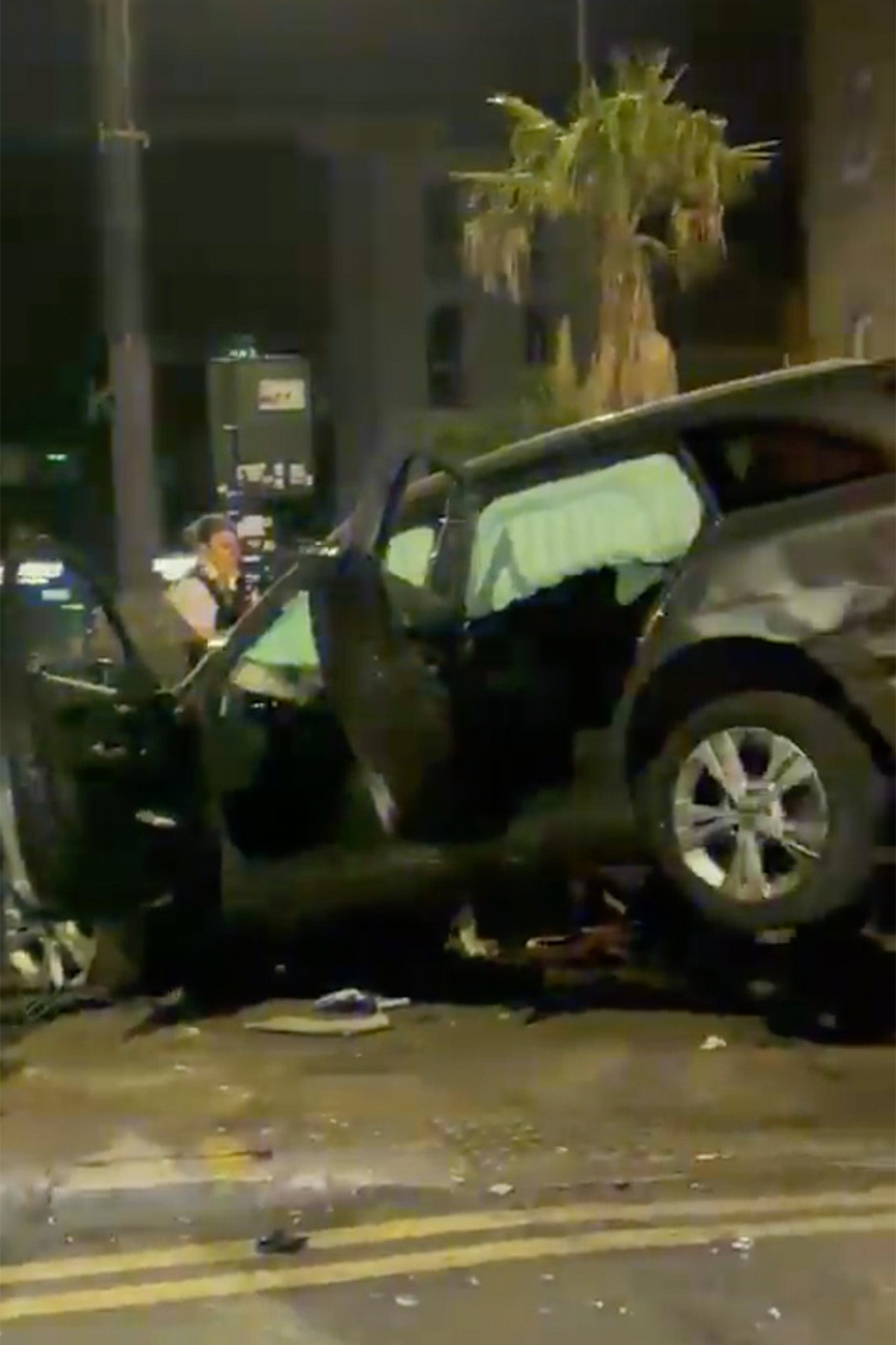 Pictured, the silver Mercedes after the crash