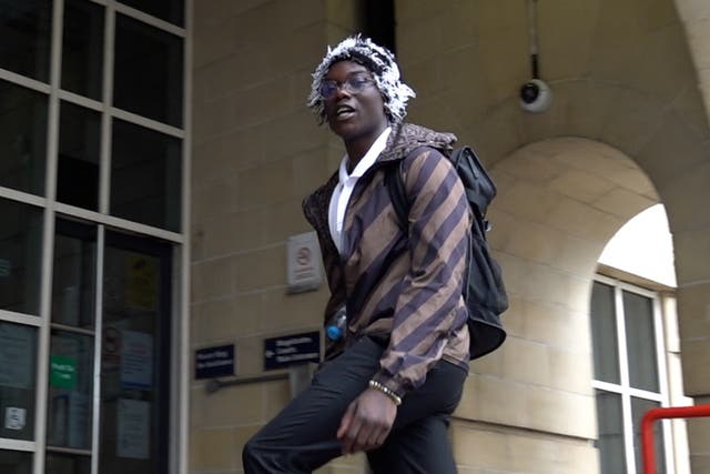 <p>Bacari-Bronze O'Garro, also known as Mizzy, arriving at Stratford Magistrates' Cour</p>