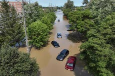 A Michigan storm with 75 mph winds downs trees and power lines; several people are killed