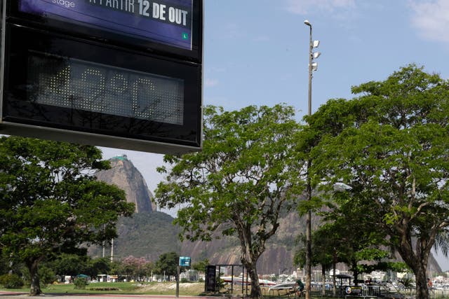 <p>A digital sign displays the temperature at 42C in Rio de Janeiro, Brazil</p>