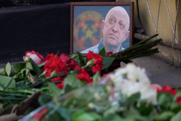 A portrait of Yevgeny Prigozhin is seen at the makeshift memorial in front of the circus building in Rostov-on-Don, on 24 August 2023