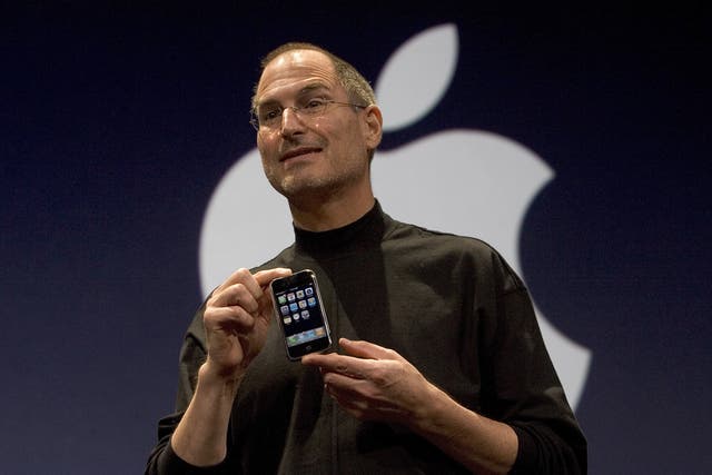 <p>Apple CEO Steve Jobs holds up the new first-generation iPhone  on 9 January 2007 in San Francisco. Apple has always been troubled by issues of efficiency and price, and that concern was the basis of its relationship with Arm from the beginning </p>