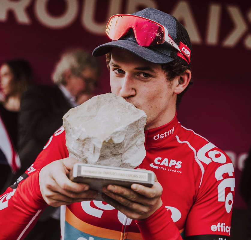 <p>Tijl De Decker poses with the under-23 Paris-Roubaix winner’s trophy</p>