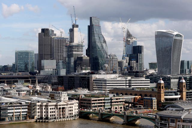 Shares in London’s top index were slightly higher on Friday (Jonathan Brady/PA)