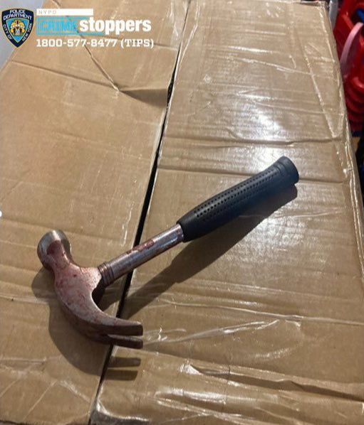 A bloodied hammer was recovered by cops in the building following the attack