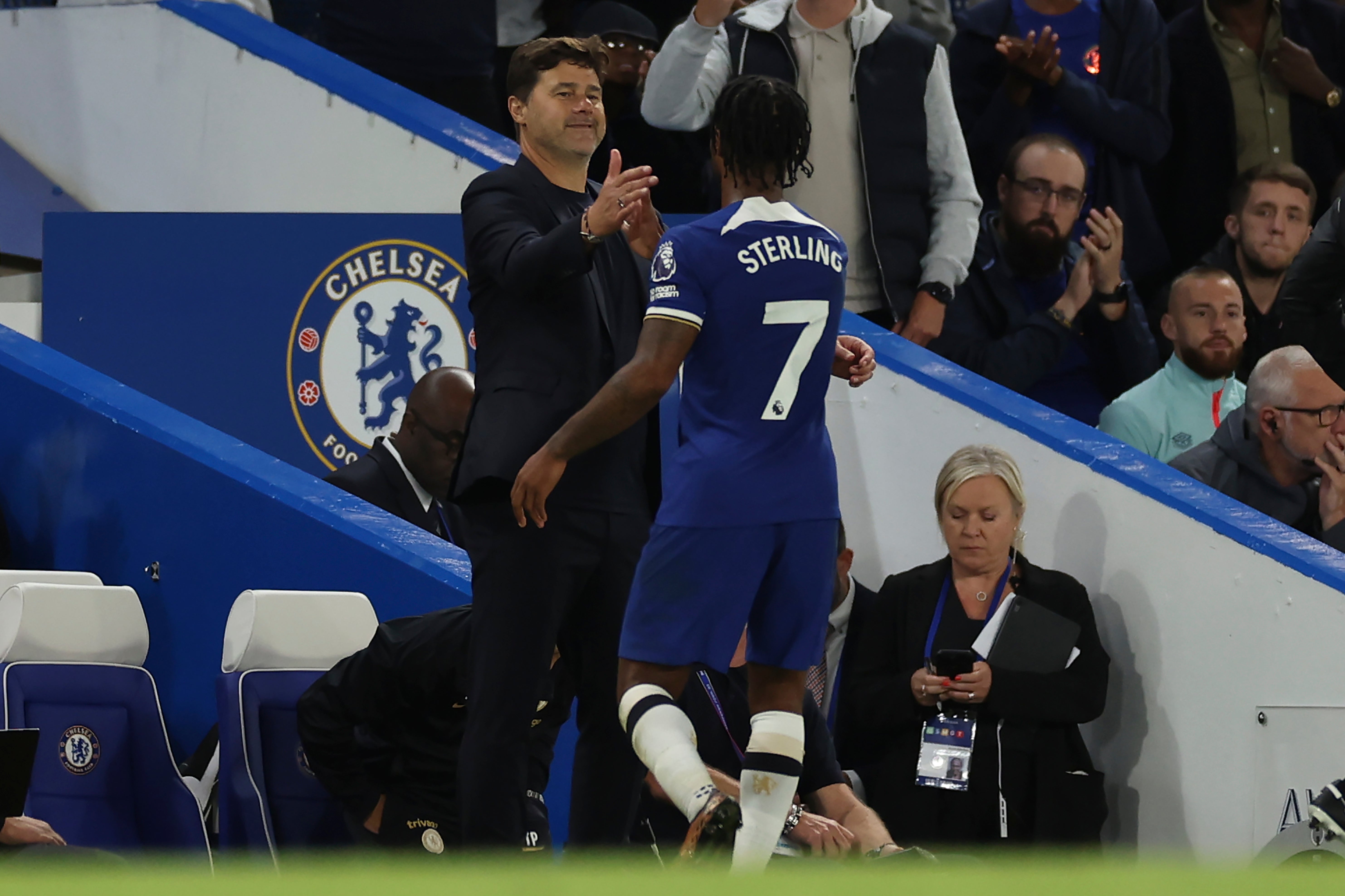 Mauricio Pochettino gives Sterling a hug after securing Chelsea’s first win of the season
