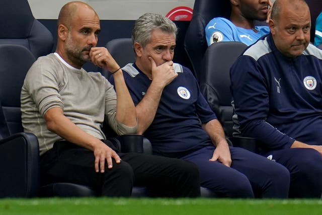 Juanma Lillo, centre, fills in for Pep Guardiola, left, this weekend (Nick Potts/PA)