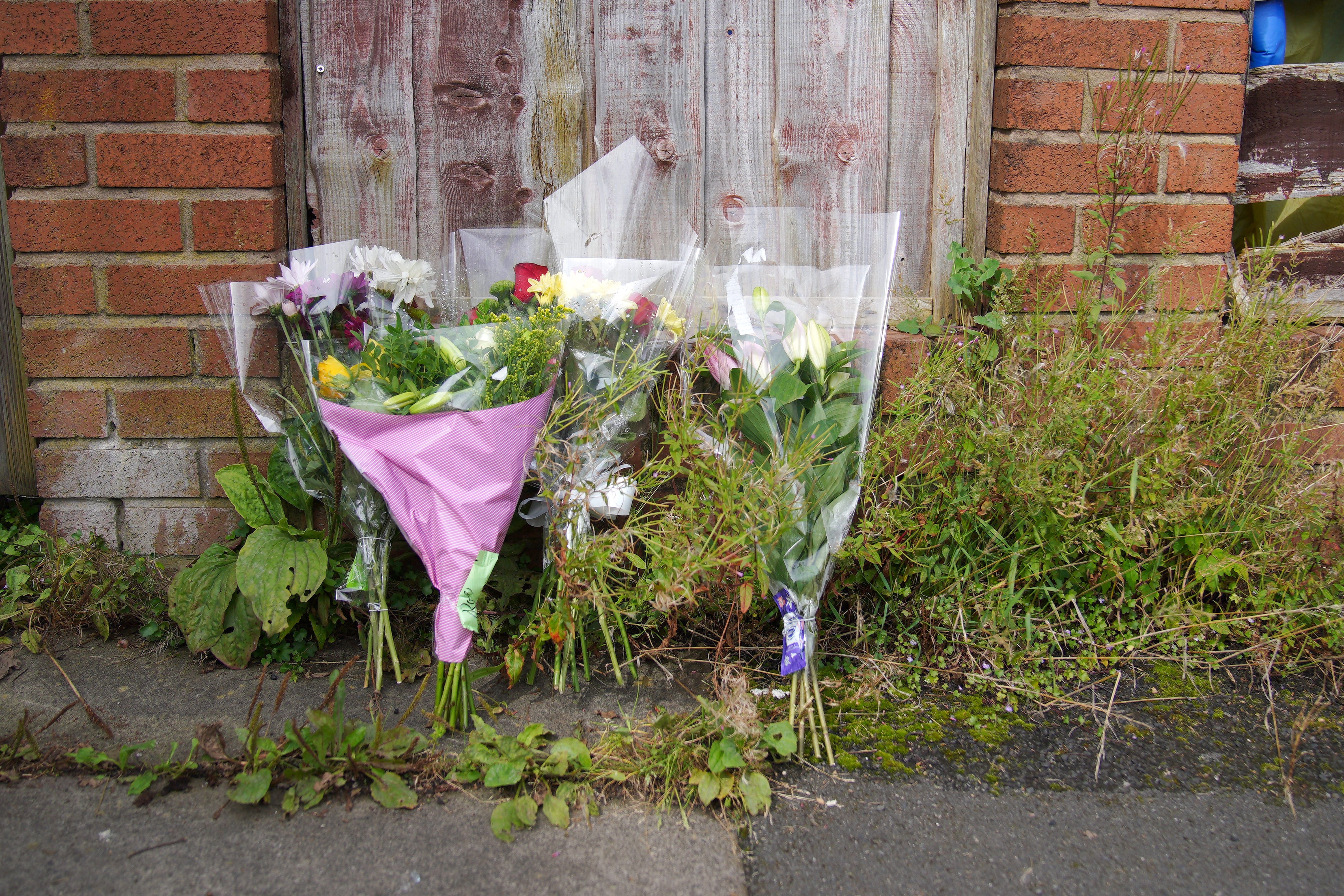 Flowers have been left outside the terraced house where Donald Patience’s body was found