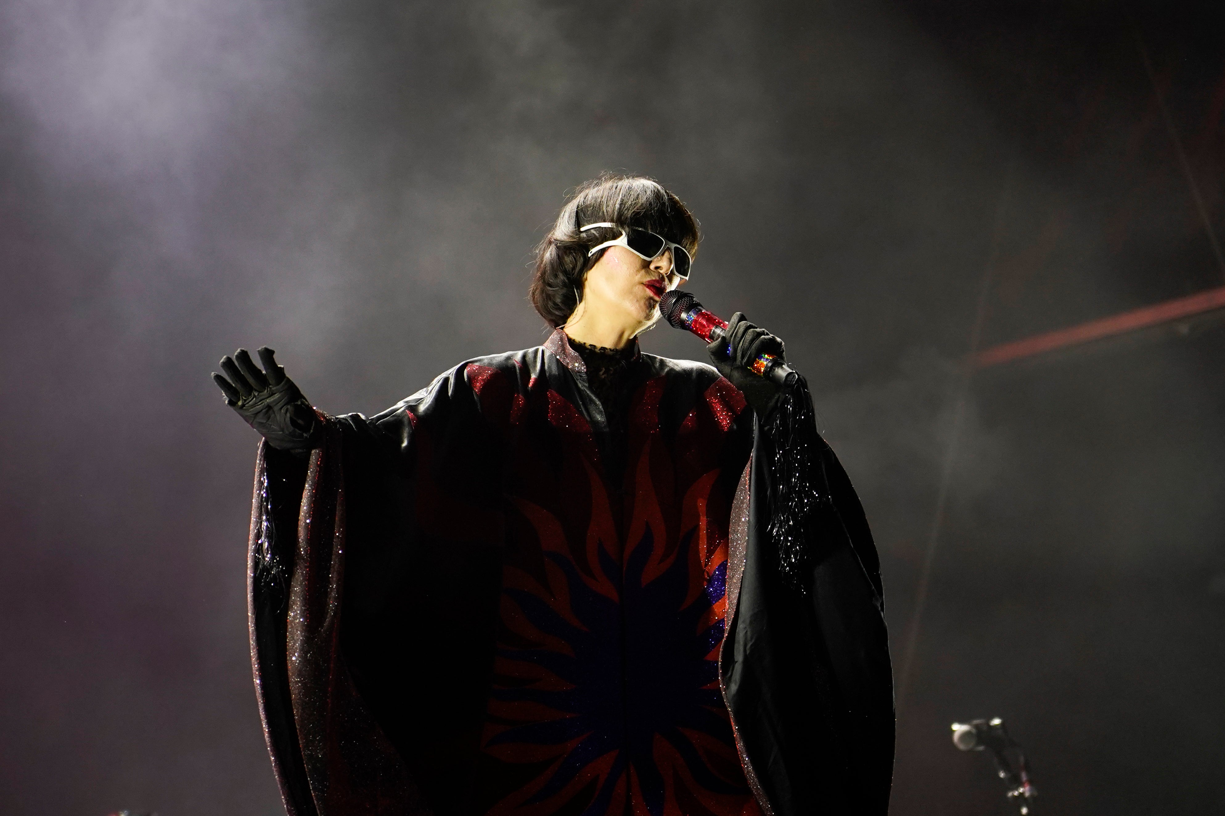 <p>Singer Karen O still has a loaded arsenal of rock-star moves 23 years into the game</p>