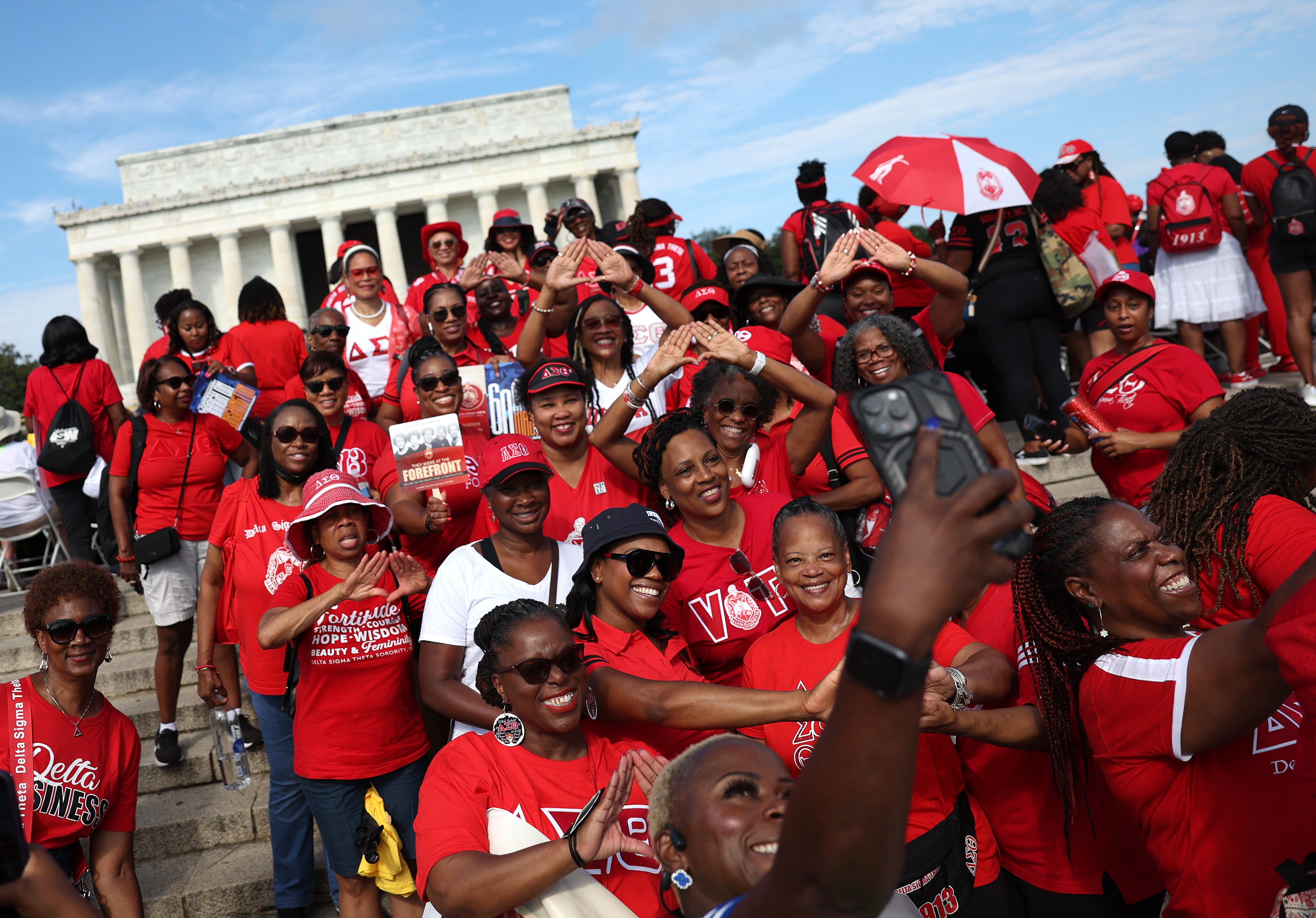 Members of the Delta Sigma Theta Sorority, Inc. gather for a photo at the 60th Anniversary Of The March On Washington at the Lincoln Memorial on August 26, 2023 in Washington, DC