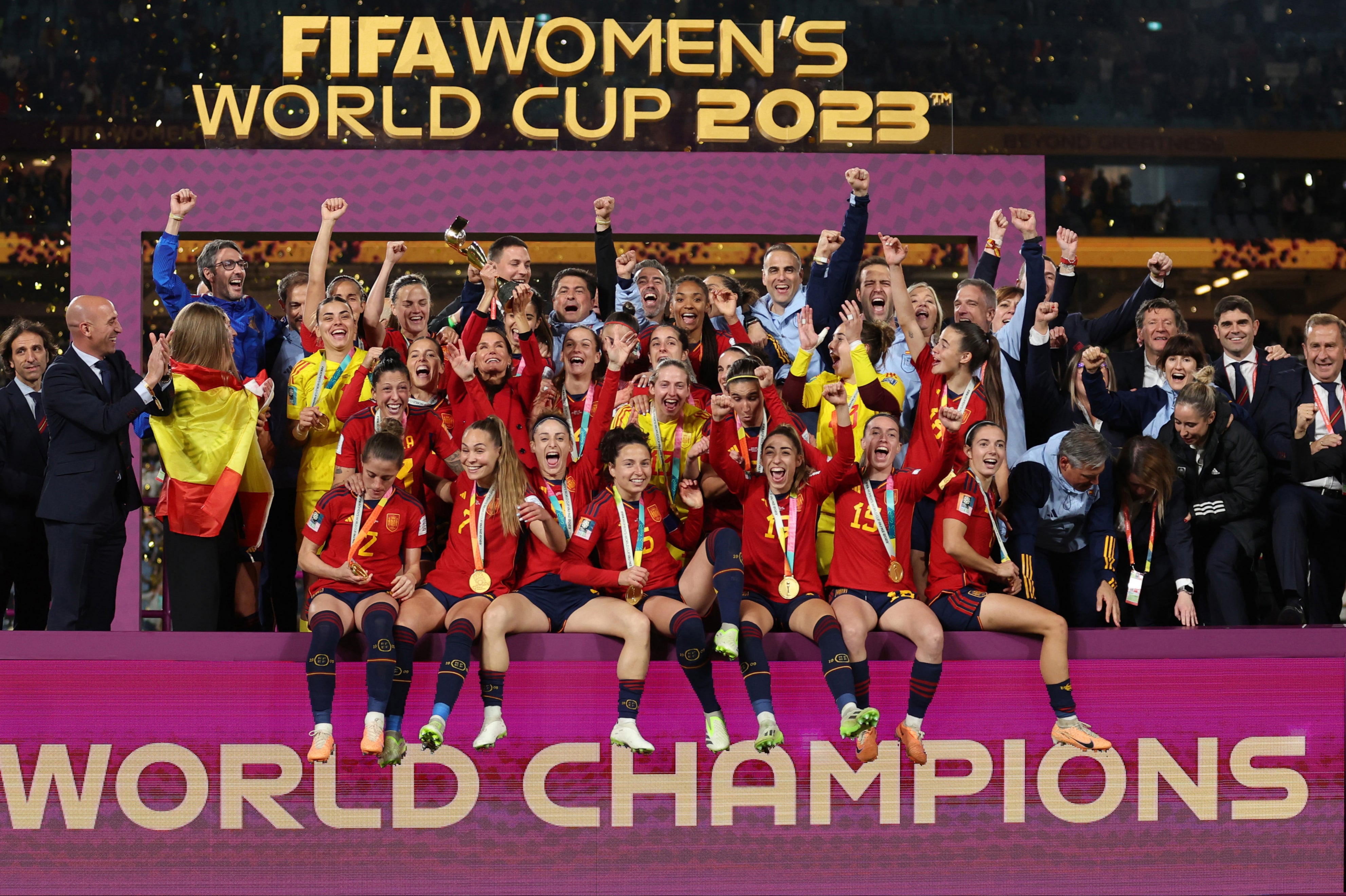 Spain’s players and coaches celebrate their World Cup win – as Luis Rubiales (second left) joins in