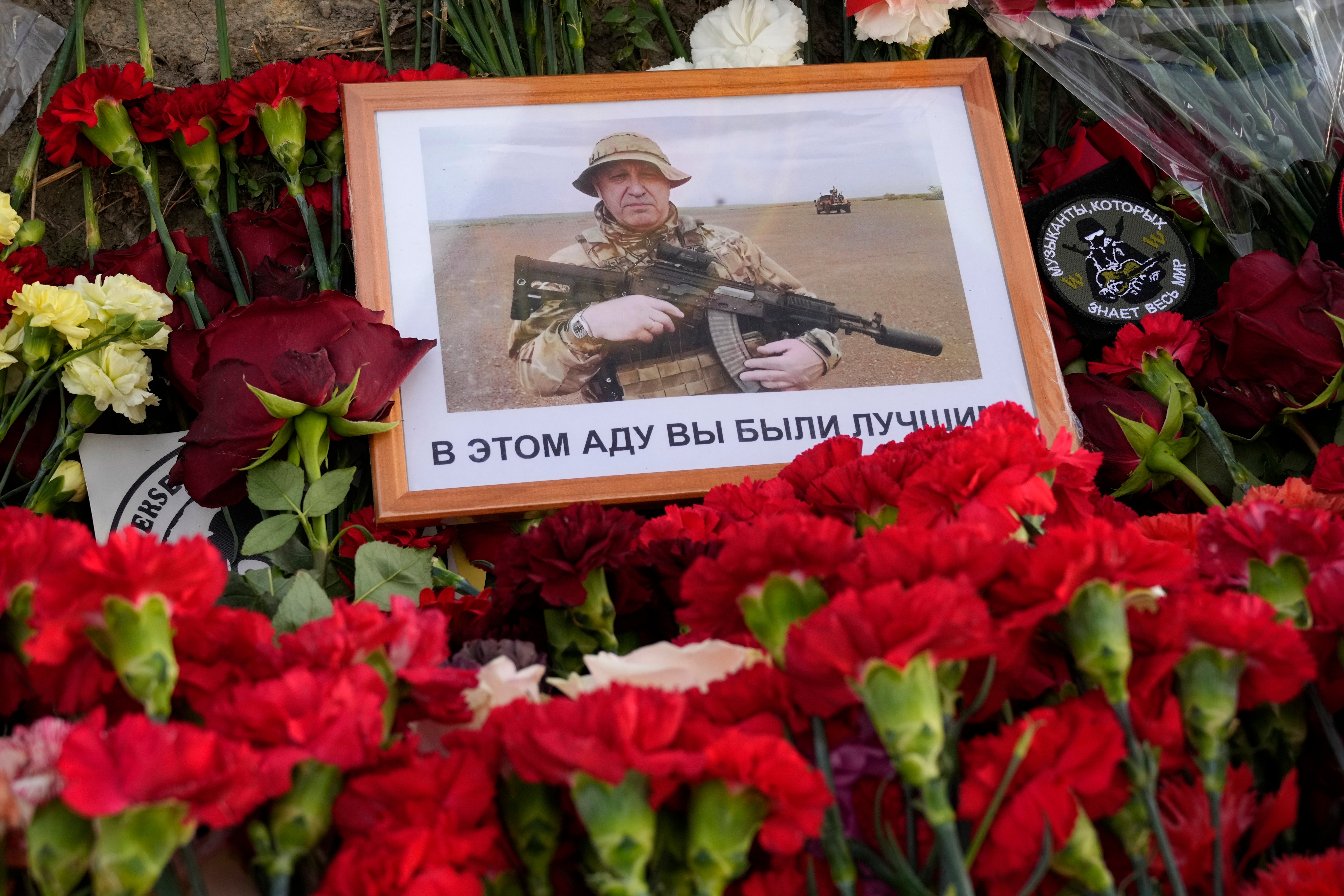 Flowers were laid with a message that says: 'In this hell you were the best' placed at an informal memorial next to the former ‘PMC Wagner Centre’ in St Petersburg