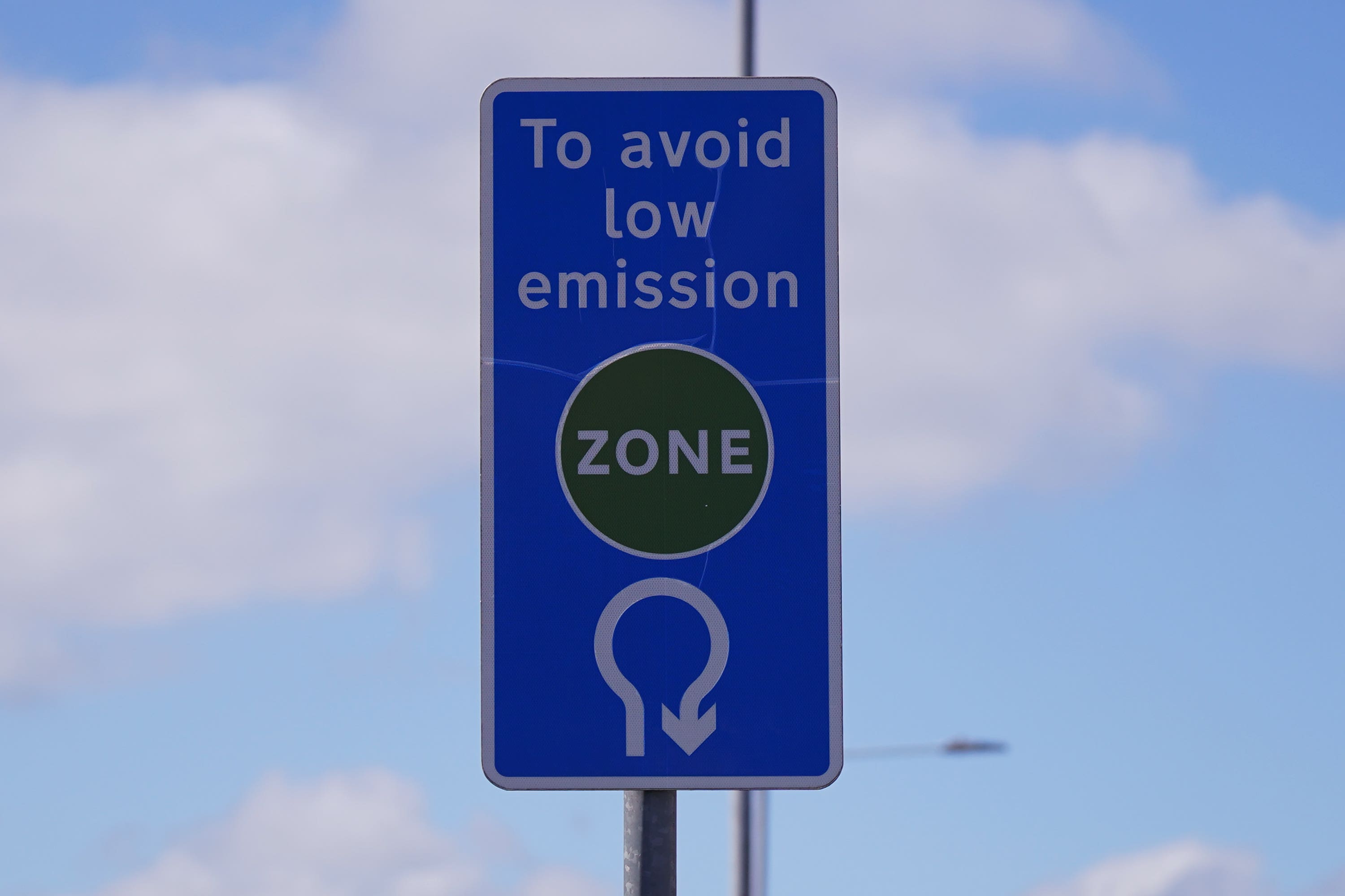 An information sign for the Ultra Low Emission Zone (Ulez) on Bridge Road in Chessington (Yui Mok/PA)