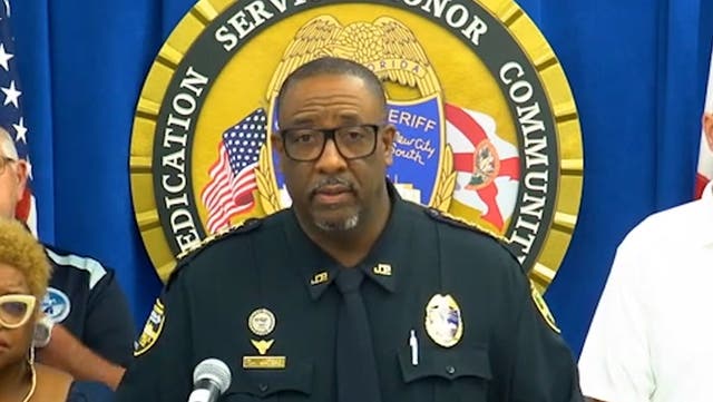 <p>Gunman kills three people in 'racially motivated' shooting in Florida, sheriff Sheriff T K Waters says.</p>