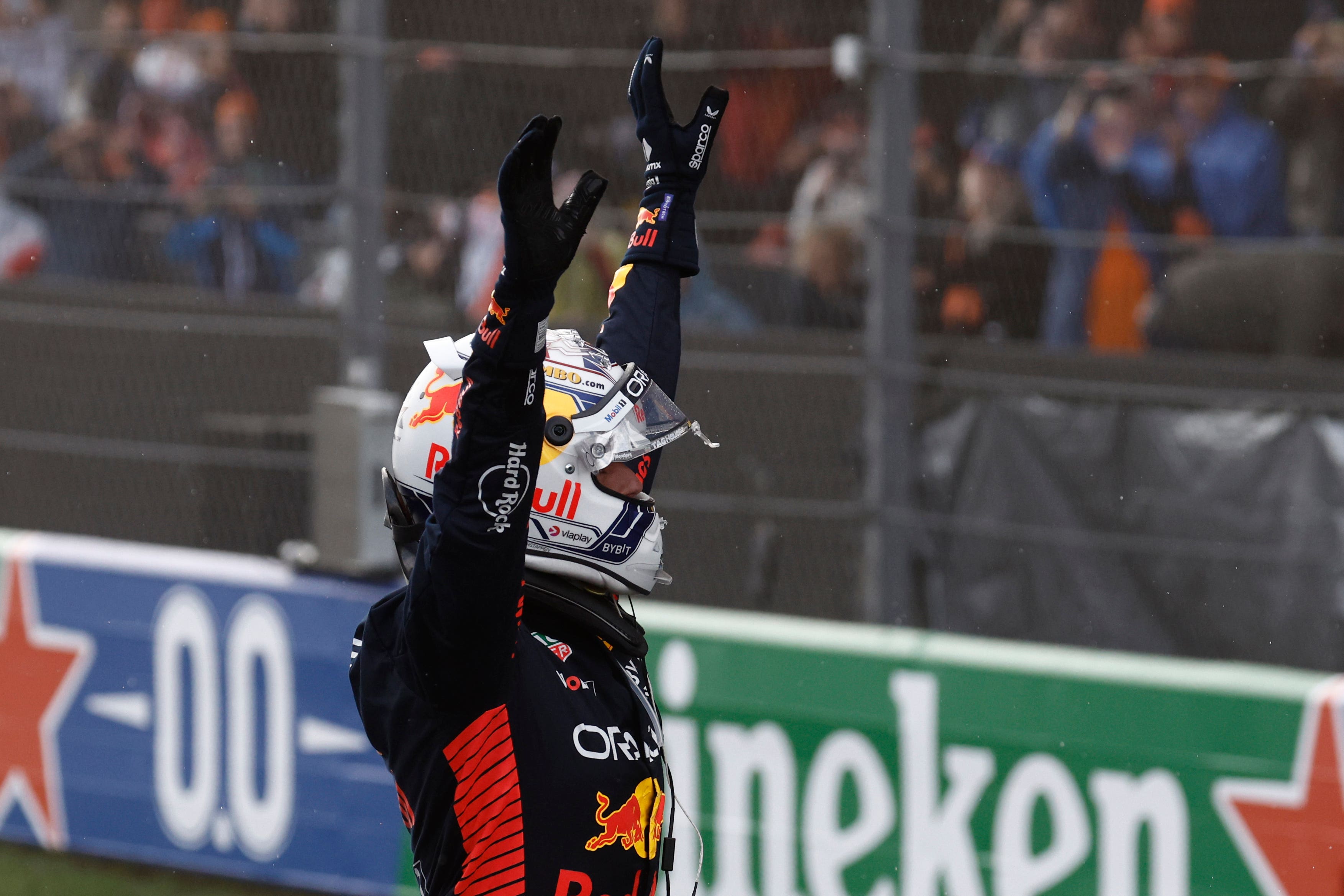 Red Bull’s Max Verstappen of the Netherlands celebrates after winning the F1 Dutch Grand Prix at the Zandvoort racetrack (Simon Wohlfart/Pool via AP)