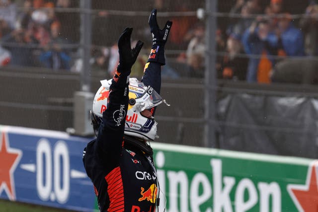 <p>Red Bull’s Max Verstappen of the Netherlands celebrates after winning the F1 Dutch Grand Prix at the Zandvoort racetrack (Simon Wohlfart/Pool via AP)</p>