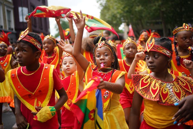 Participants taking part in the Children’s Day Parade (Yui Mok/PA)