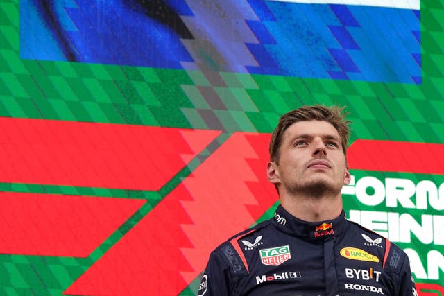 Red Bull’s Max Verstappen on the podium after winning the Dutch Grand Prix (Tim Goode/AP)
