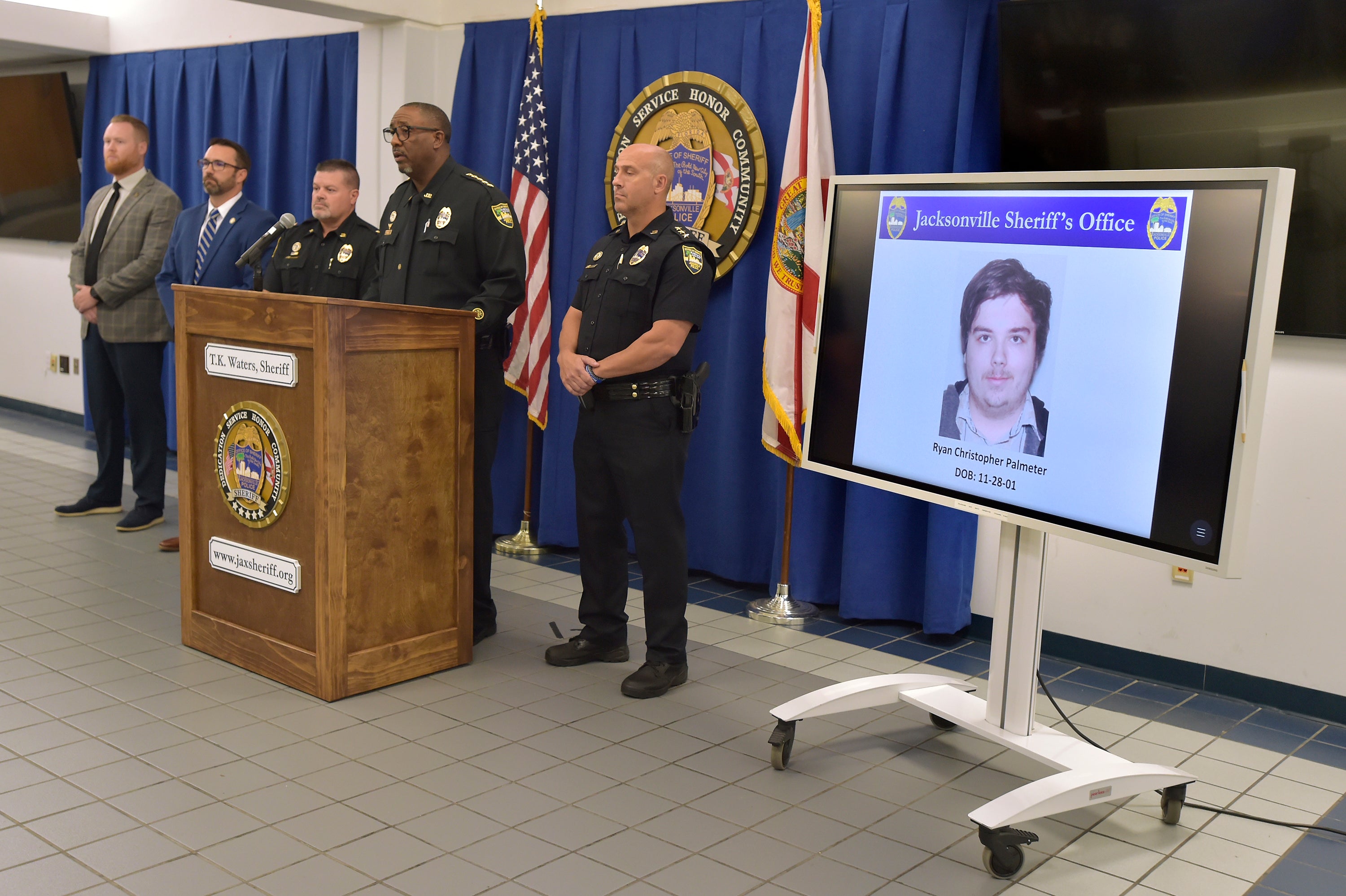 A photograph of shooter Ryan Christopher Palmeter is shown on a video monitor during Sheriff TK Waters’ press conference at the Jacksonville Sheriff's Office headquarters in Florida on Sunday
