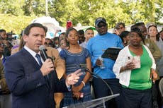 Ron DeSantis is booed by mourners as he attends Jacksonville vigil after racist shooting