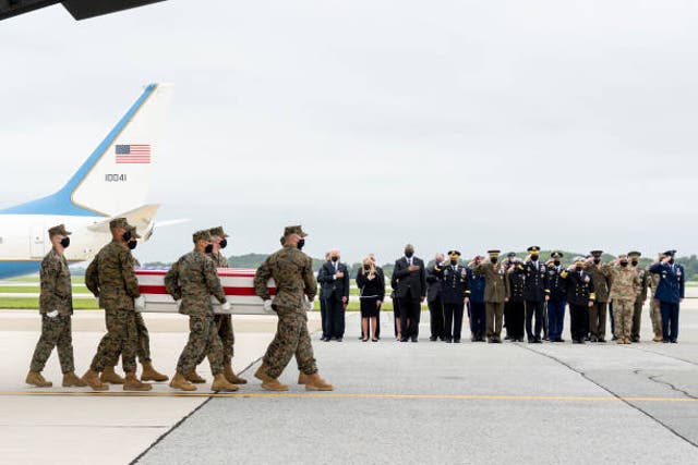 <p>In this handout photo provided by the US Air Force, a US Marine Corps carry team transfers the remains of Marine Corps Sgt Nicole L Gee of Sacramento, California, 29 August 2021 at Dover Air Force Base, Delaware</p>