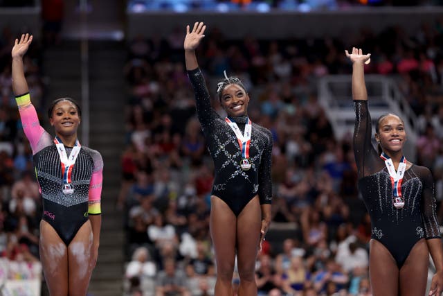 <p>Simone Biles stands on top of the podium at the US Championships</p>