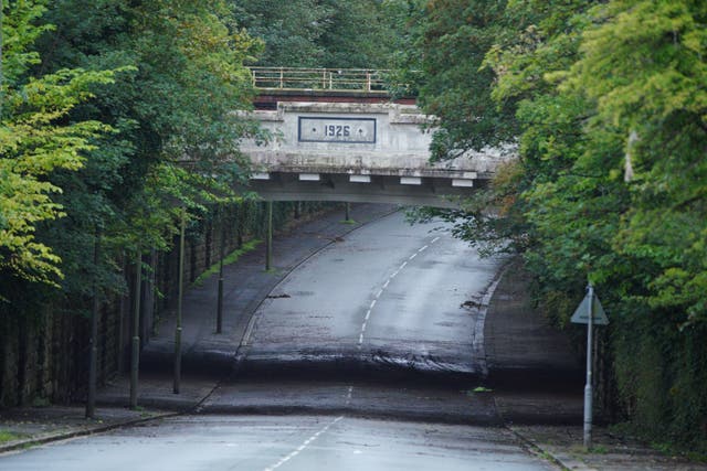 <p>A view of Queens Drive in the Mossley Hill area of Liverpool where two people died after driving a car into a flood. </p>