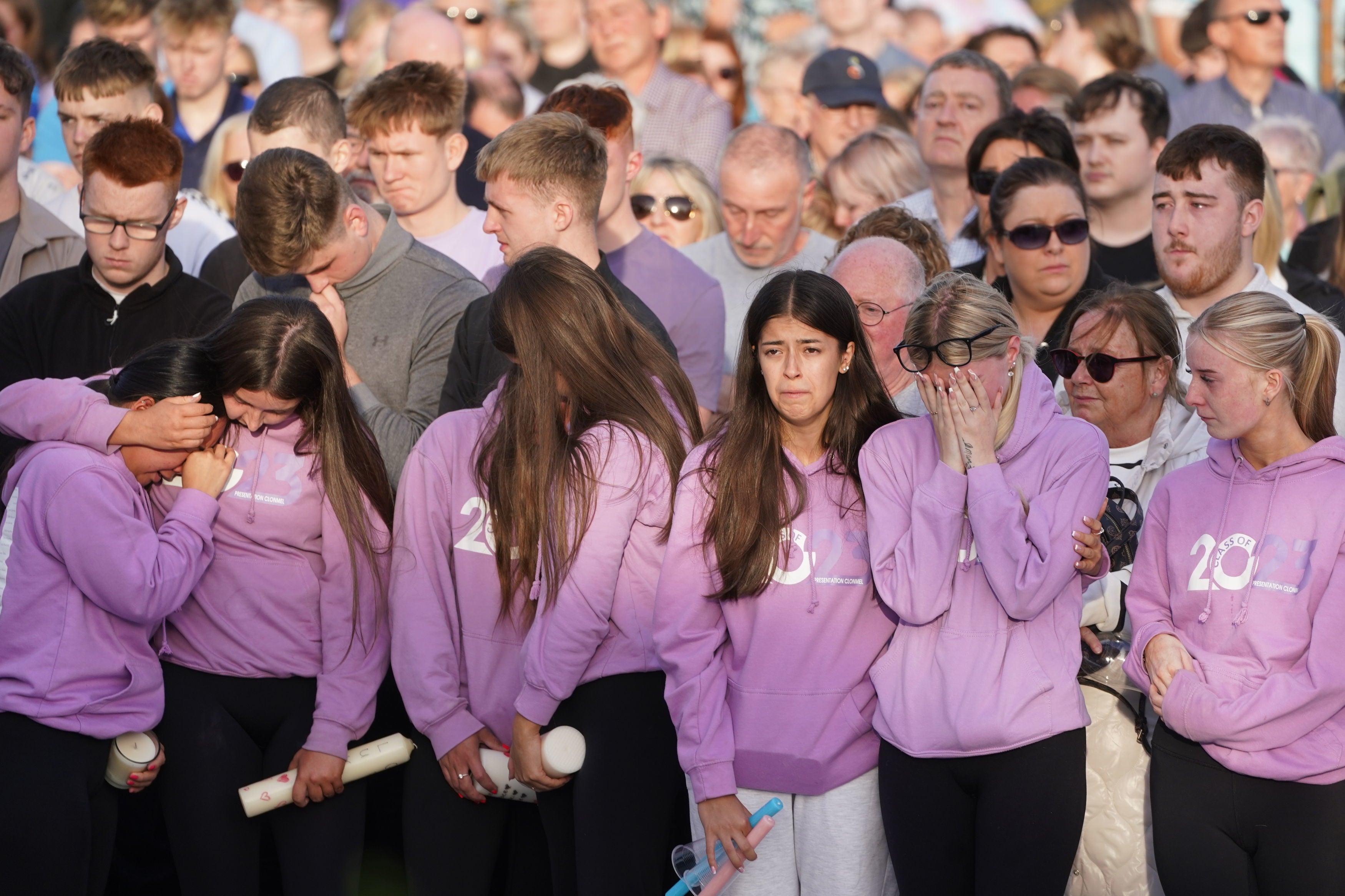 Pupils from the class of 2023 from Clonmel Presentation Secondary School, attend a vigil in Kickham Plaza, Co Tipperary