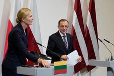 Poland, Baltic states warn they could seal border with Belarus if military, migrant tensions grow