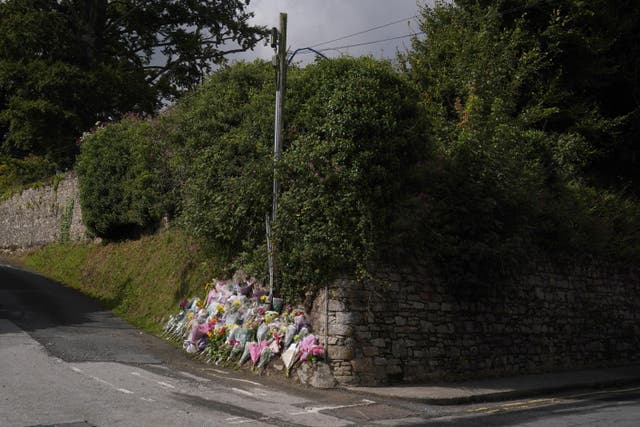 Flowers and tributes left at the scene in Clonmel (Brian Lawless/PA)