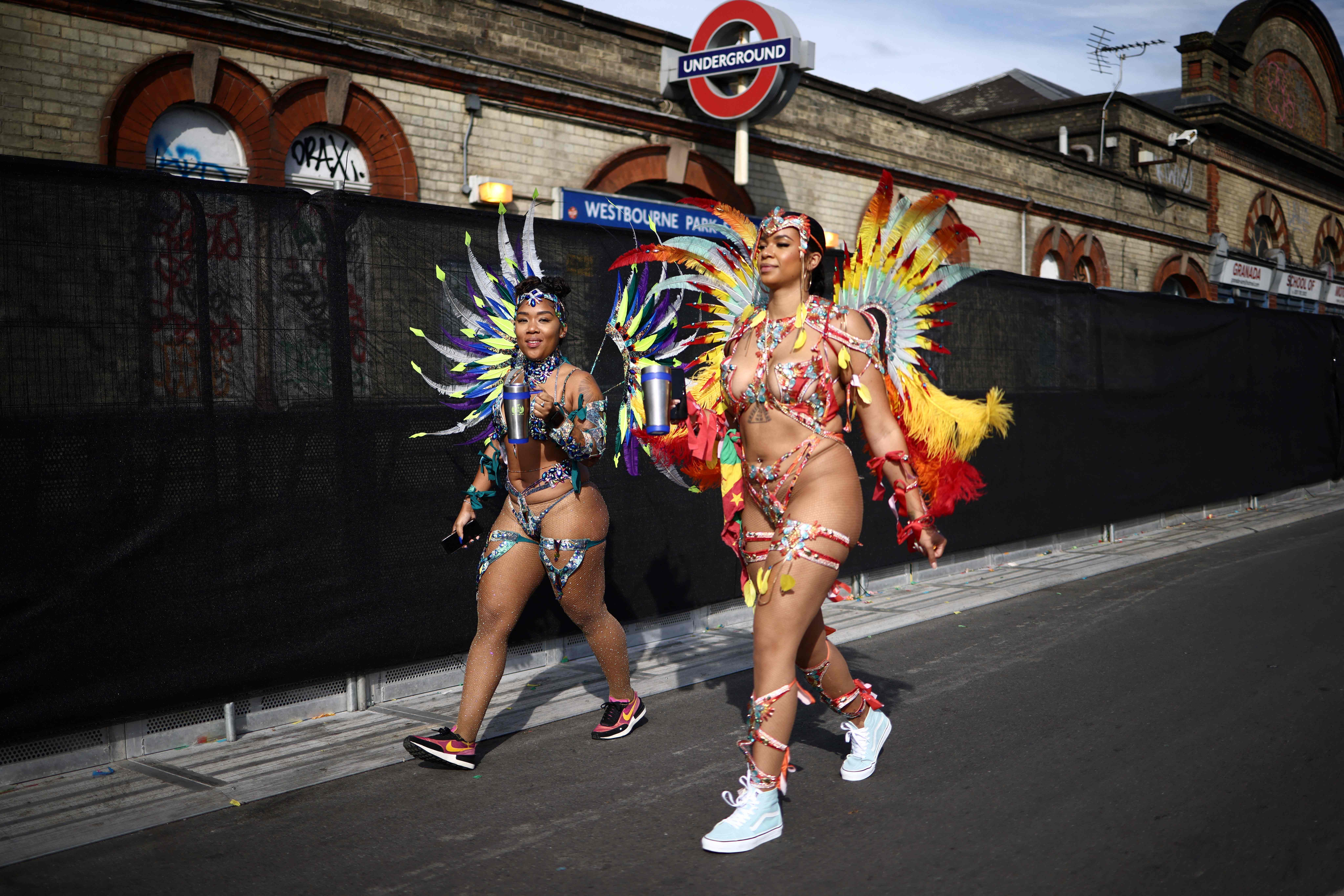 Performers arrive to take part in the main parade of the Notting Hill Carnival
