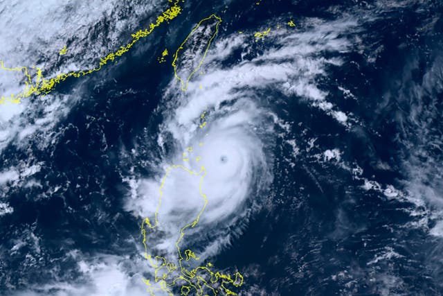 <p>Satellite footage shows Typhoon Saola moving over Taiwan</p>