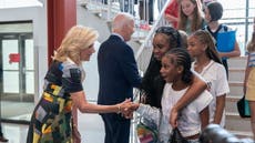 DC schoolchildren look bemused as Bidens welcome them back to school