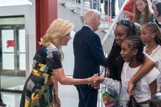 DC schoolchildren look bemused as Bidens welcome them back to school