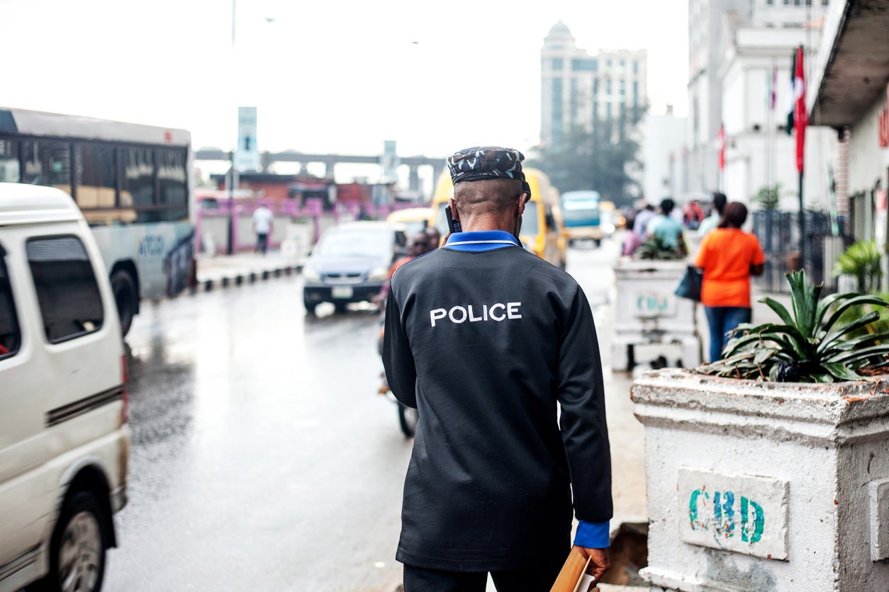 File photo: A police officer walks through the streets of Lagos, Nigeria