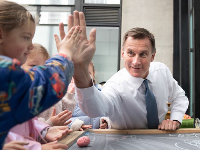 <p>Chancellor Jeremy Hunt during a visit to Busy Bees Battersea Nursery in south London</p>