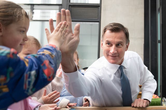 <p>Chancellor Jeremy Hunt during a visit to Busy Bees Battersea Nursery in south London</p>