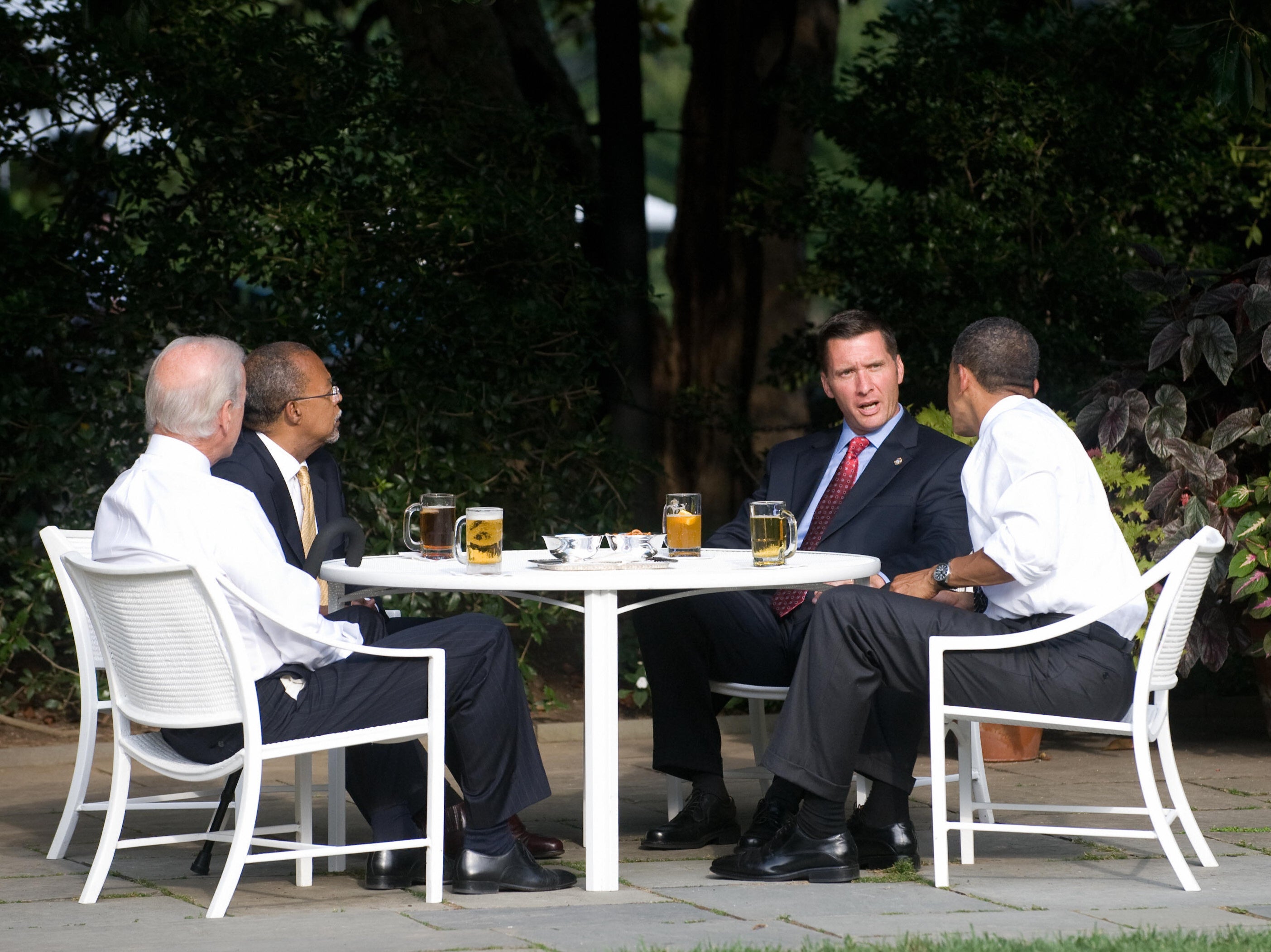Joe Biden and Barack Obama enjoying a beer with Harvard professor Henry Louis Gates Jr and Massachusetts police sergeant James Crowley on the South Lawn of the White House in July 2009