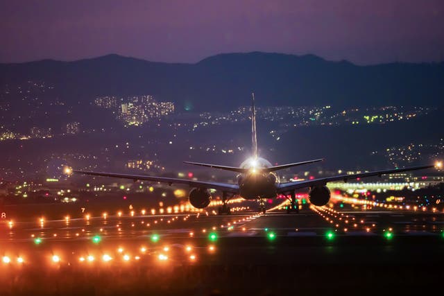 <p>Lighting the way: some departures to Heathrow are held on the ground so they do not arrive in the middle of the night </p>