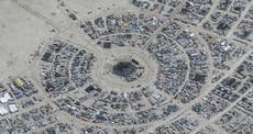 Burning Man turns to mud pit as attendees urged to shelter in place amid heavy downpours