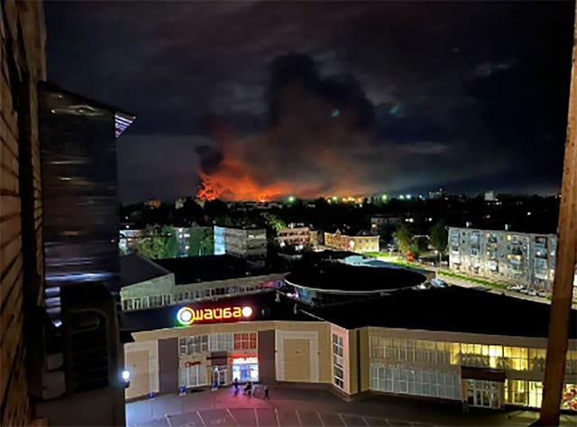 <p>Smoke billowing over the city and a large blaze in Pskov, Russia</p>