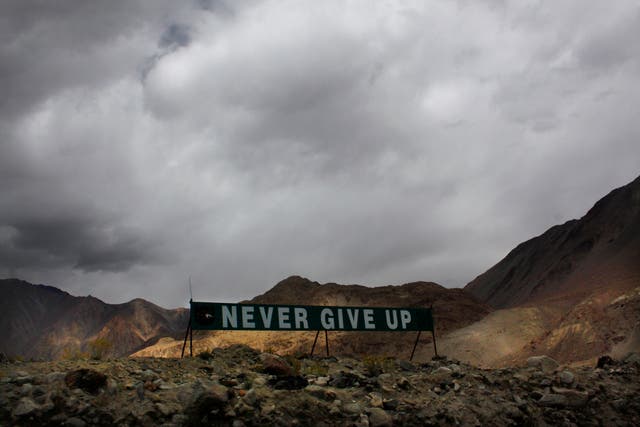 <p>File. A banner erected by the Indian army stands near Pangong Tso lake near the India-China border in India’s Ladakh, 14 September 2017</p>