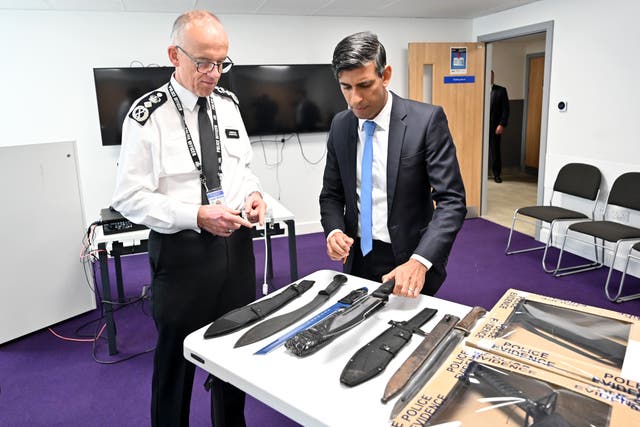 Rishi Sunak, right, said the Government had spoken to police to hear first-hand what was needed to keep reducing knife crime (Justin Tallis/PA)