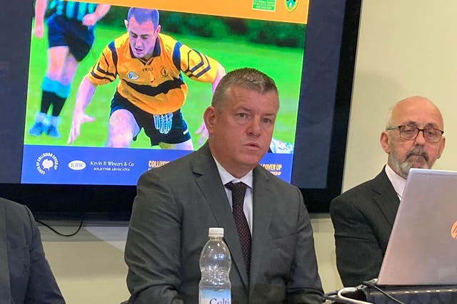 Gerard Lawlor’s family’s solicitor Niall Murphy (left) and Mr Lawlor’s father John react to a Police Ombudsman’s report (Rebecca Black/PA)