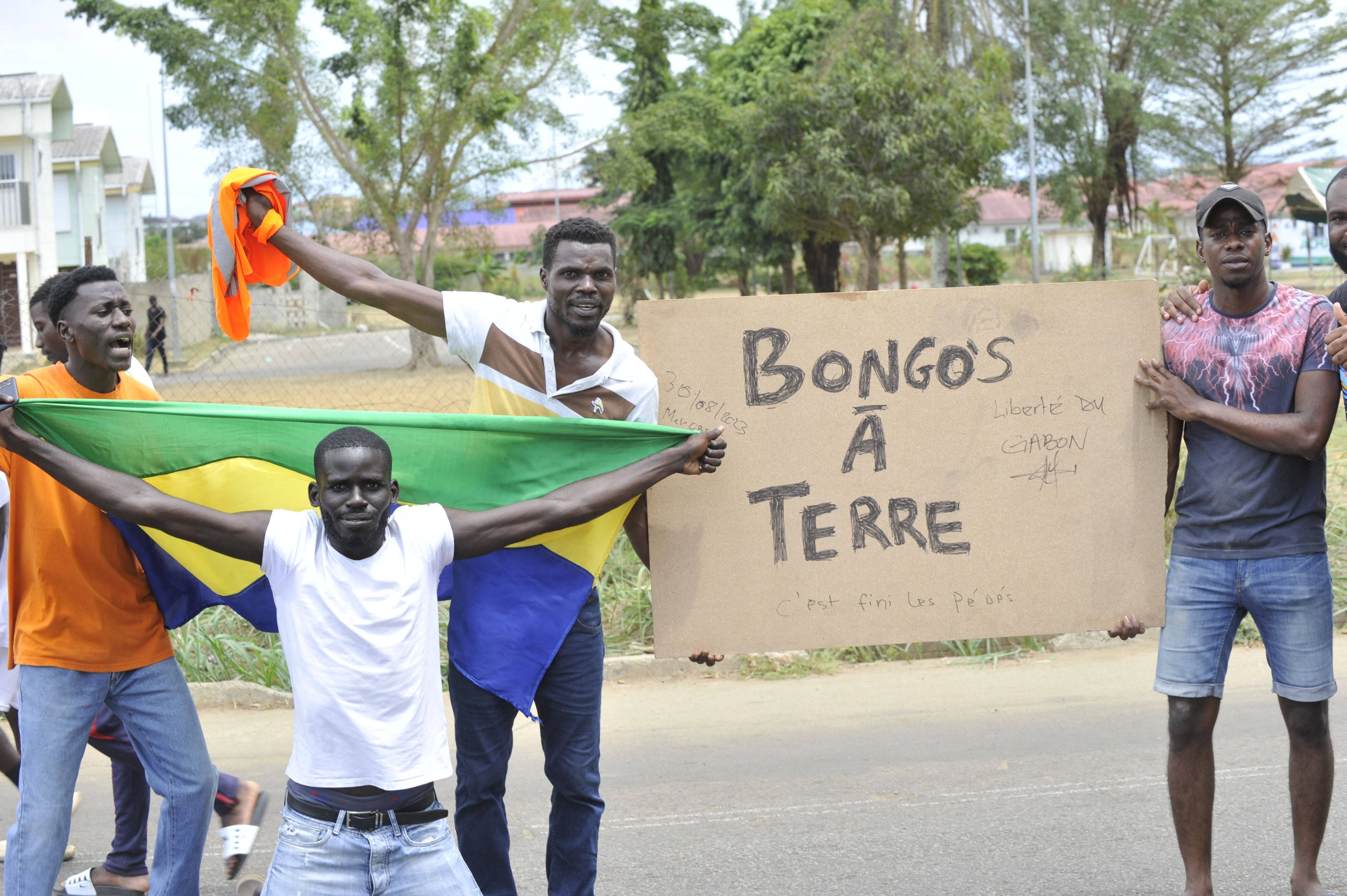 Residents in Gabon celebrate the apparent coup
