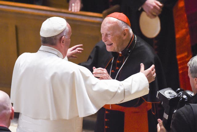 <p>Cardinal Archbishop emeritus Theodore McCarrick (C) greets Pope Francis (L) during Midday Prayer of the Divine with more than 300 U.S. Bishops at the Cathedral of St. Matthew the Apostle on September 23, 2015 in Washington, DC. </p>