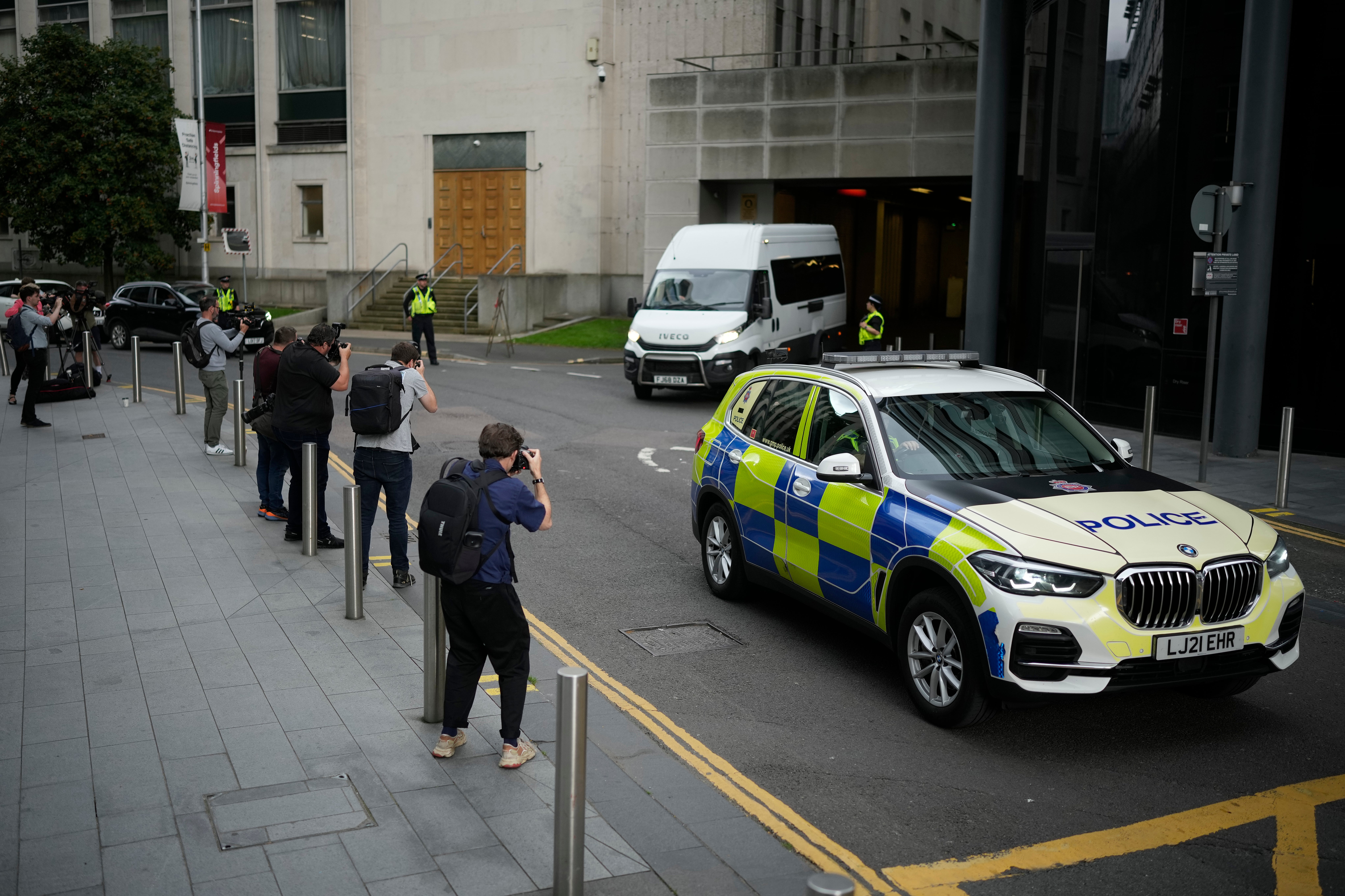 A police car escorts the prison van believed to be carrying the convicted hospital nurse Lucy Letby leaves Manchester Crown Court, 21 August 2023