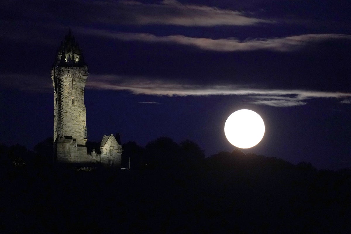 In Pictures: Rare super blue moon delights stargazers | The Independent